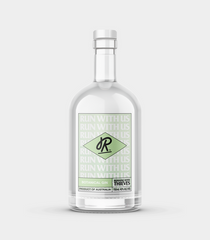 A clear bottle containing transparent liquid, presumably the botanical gin, with a label that includes green botanical illustrations and the brand name 'R+P' displayed prominently.