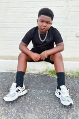 Black Jordan Craig Kids Tonal T-Shirt, casual kids' tee with subtle branding and simple design, featuring a comfortable fit and soft fabric.