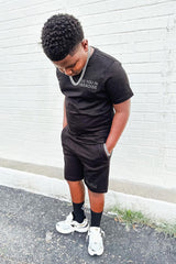 Black Jordan Craig Kids Tonal T-Shirt with subtle logo detail, made for comfortable everyday wear.