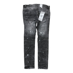 FWRD Evolution Slim Distressed Denim in Washed Black, showing fitted black denim jeans with distressed details and a slim fit.