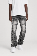 FWRD 'Eyelet' Stacked Denim in Washed Black, showcasing the denim fabric with eyelet details and a stacked design.