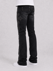 Black denim flared jeans with cross embroidery from Original Fables, shown from the front in this image.