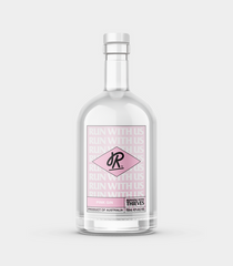 A clear bottle containing pink gin with a label that includes the text 'Thieves' and the name of the product.
