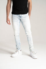 Spark Basic Stretch Denim in bleach blue, featuring slim fit design, visible stitching, and classic five-pocket style.