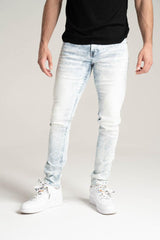 Spark Basic Stretch Denim in bleach blue, men's denim jeans, close-up view of blue stretch denim fabric and stitching.