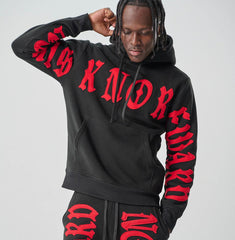 Black and red Spark hoodie with "No Risk No Reward" graphic, featuring a comfortable fit and casual style.