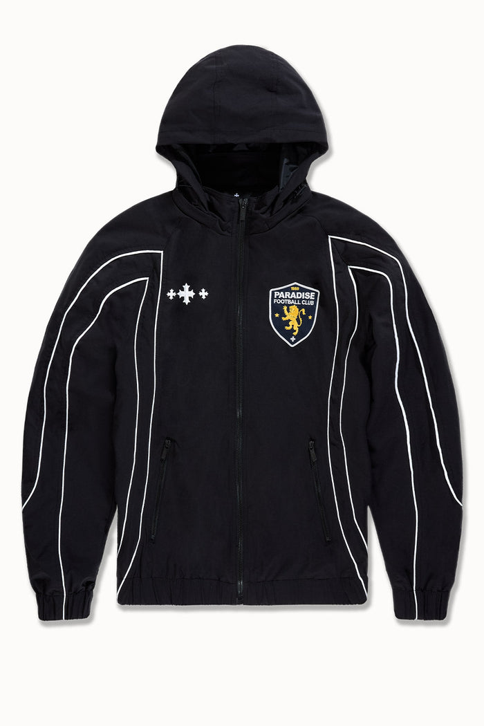 Black SYIP Hooligan Track Jacket with removable hood, featuring sporty design and zip-up front, shown on a model.