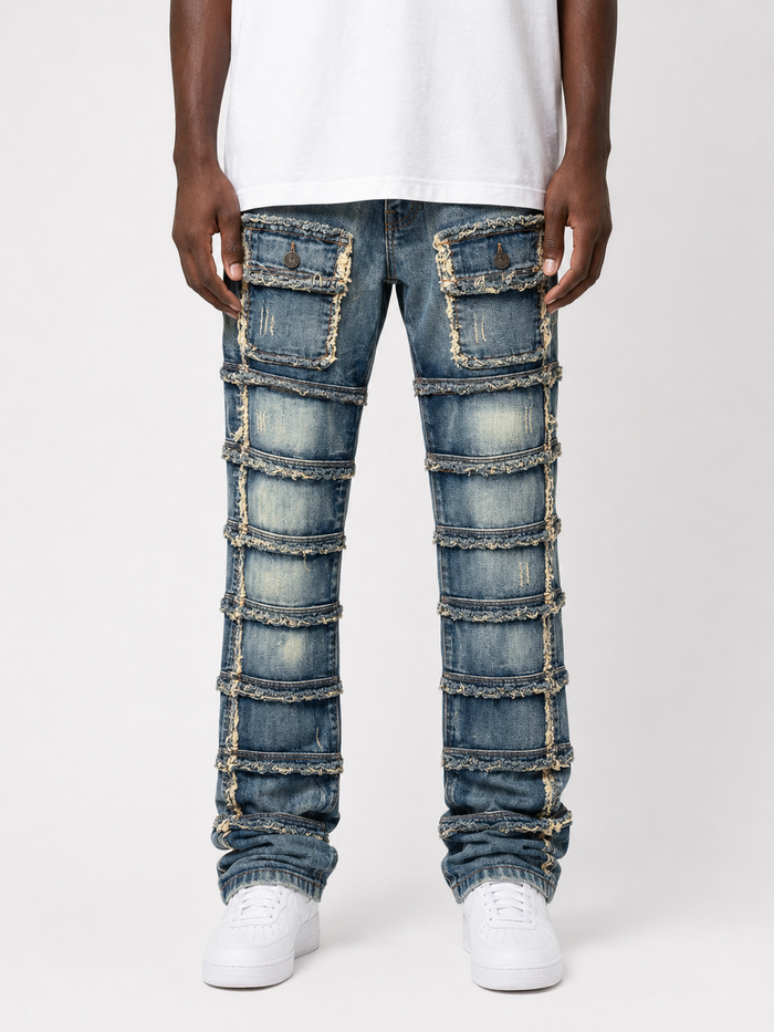 FWRD Patchwork True Stacked Denim jeans in light tint featuring patchwork and stacked leg design.