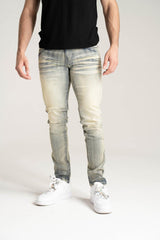 Spark Stretch Basic Denim in Rustic Blue, showing the fitted denim pants with classic five-pocket design and subtle stitching.