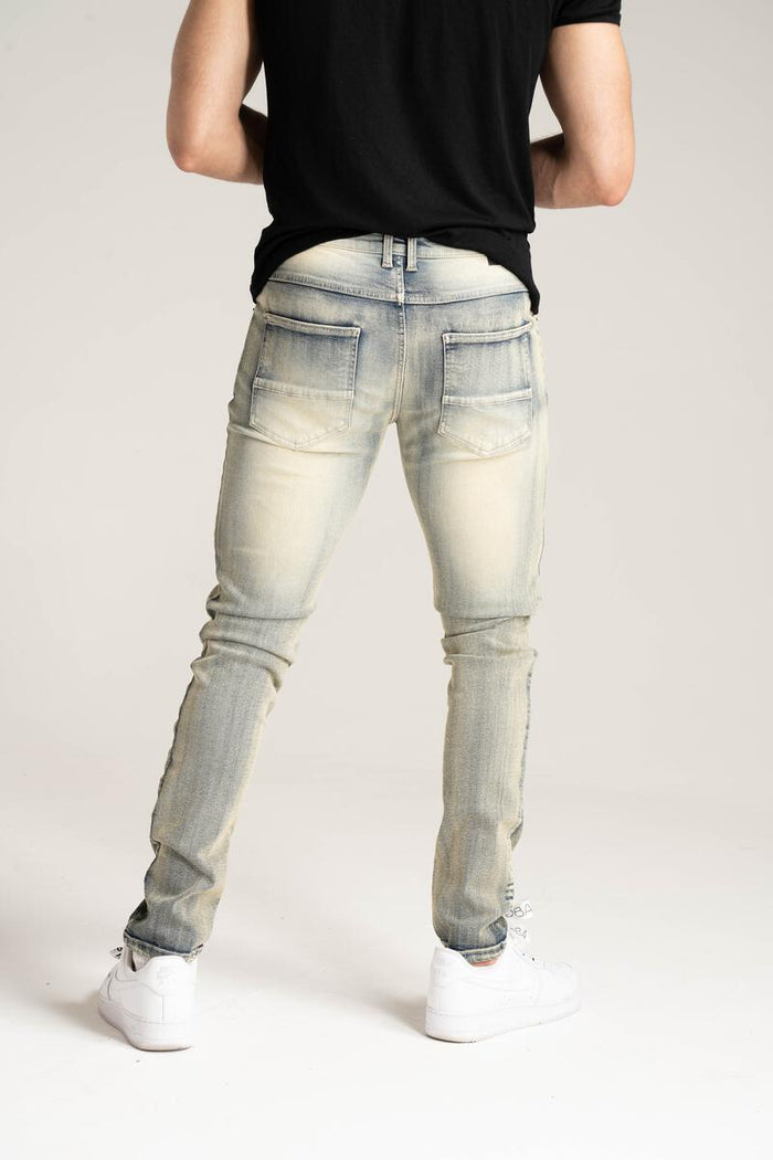 Spark Stretch Basic Denim in Rustic Blue, showcasing a pair of stylish, fitted denim jeans from the SPARK brand.
